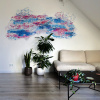Baby fishes (2025), muurschildering en papierstructuren, circa 130 x 260 cm (in opdracht - particuliere collectie).
