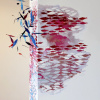 Amsterdamse haringschool (2025), muurschildering en papierstructuren, circa 70 x 125 x 20 cm (in opdracht - particuliere collectie).